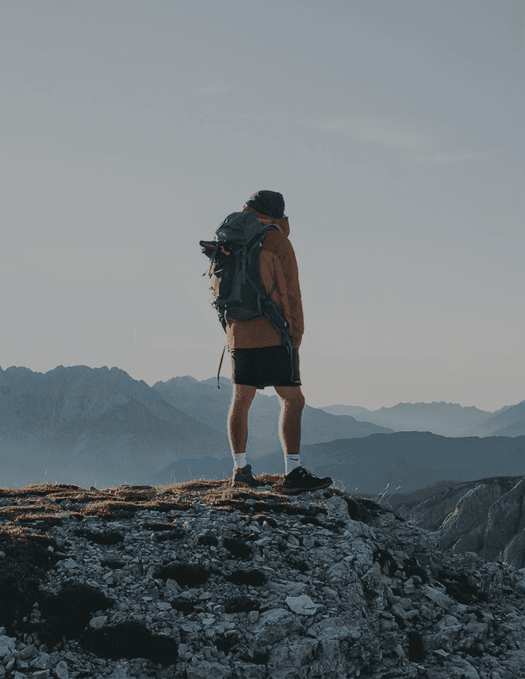 Will Moore Standing on mountaintop